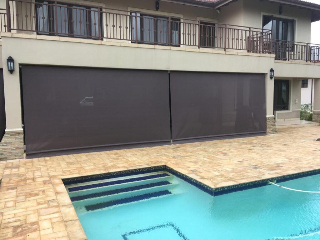 Sheerweave blinds and solar shades installed on an outdoor patio